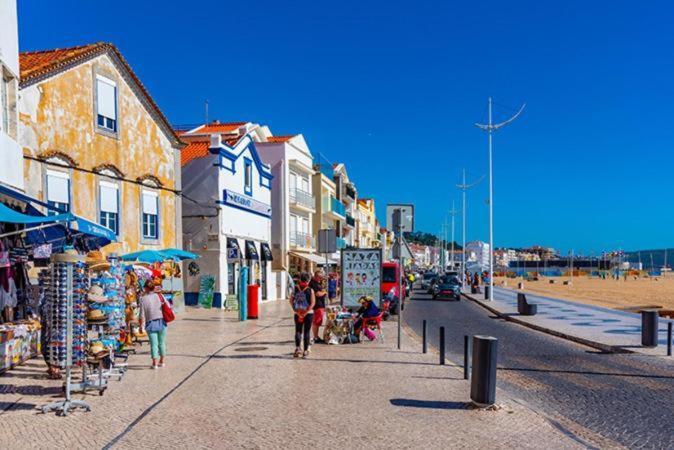 Sunset Terrace - Beachfront Apartment With Private Parking Nazaré Buitenkant foto